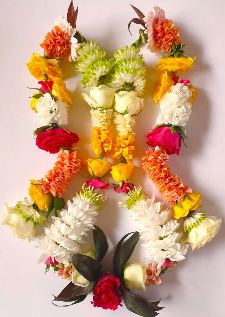 Shakti Bloemenmala Tonny Bol kleurrijke ceremoniële bloemenslinger Persoonlijk Trainings Traject regio Nijmegen